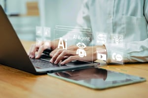 Agentic AI agents displayed over an open laptop