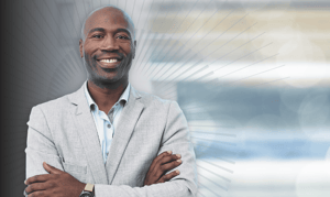 A business analyst folding his arms benefits from an Inventory Control Center.